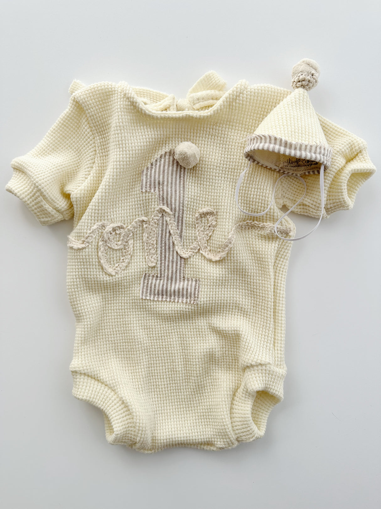 Cream Waffle “ONE”sie Collection